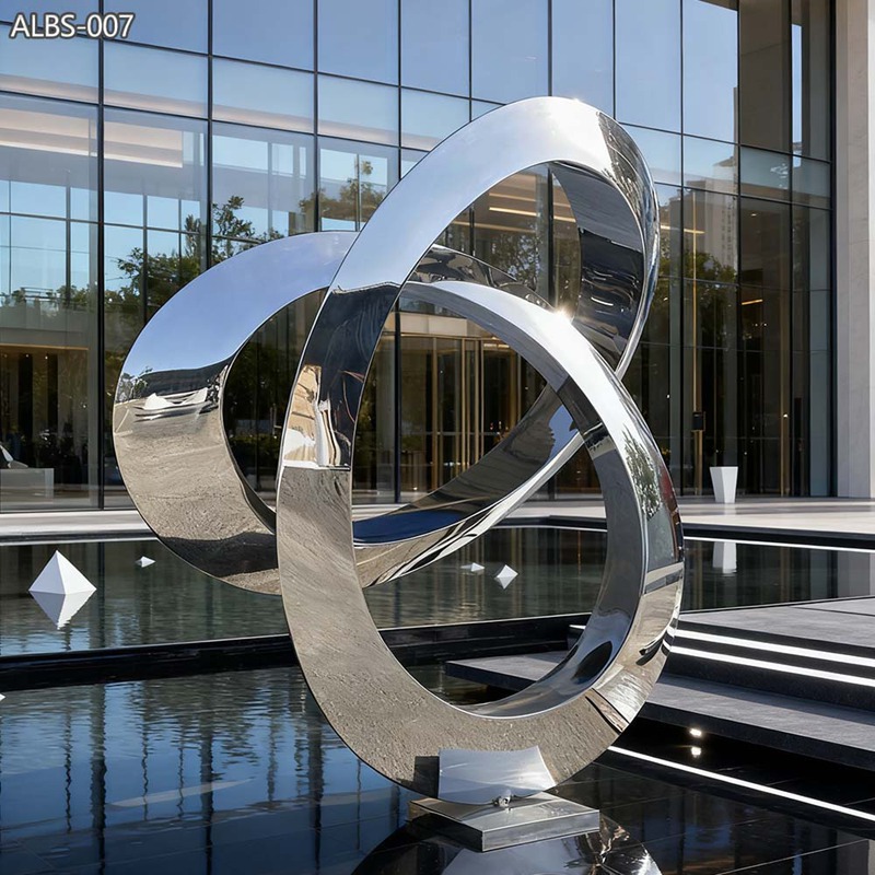 منحوتة معدنية عصرية من الفولاذ المقاوم للصدأ على شكل حلقة