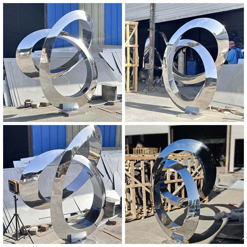 منحوتة معدنية عصرية من الفولاذ المقاوم للصدأ على شكل حلقة